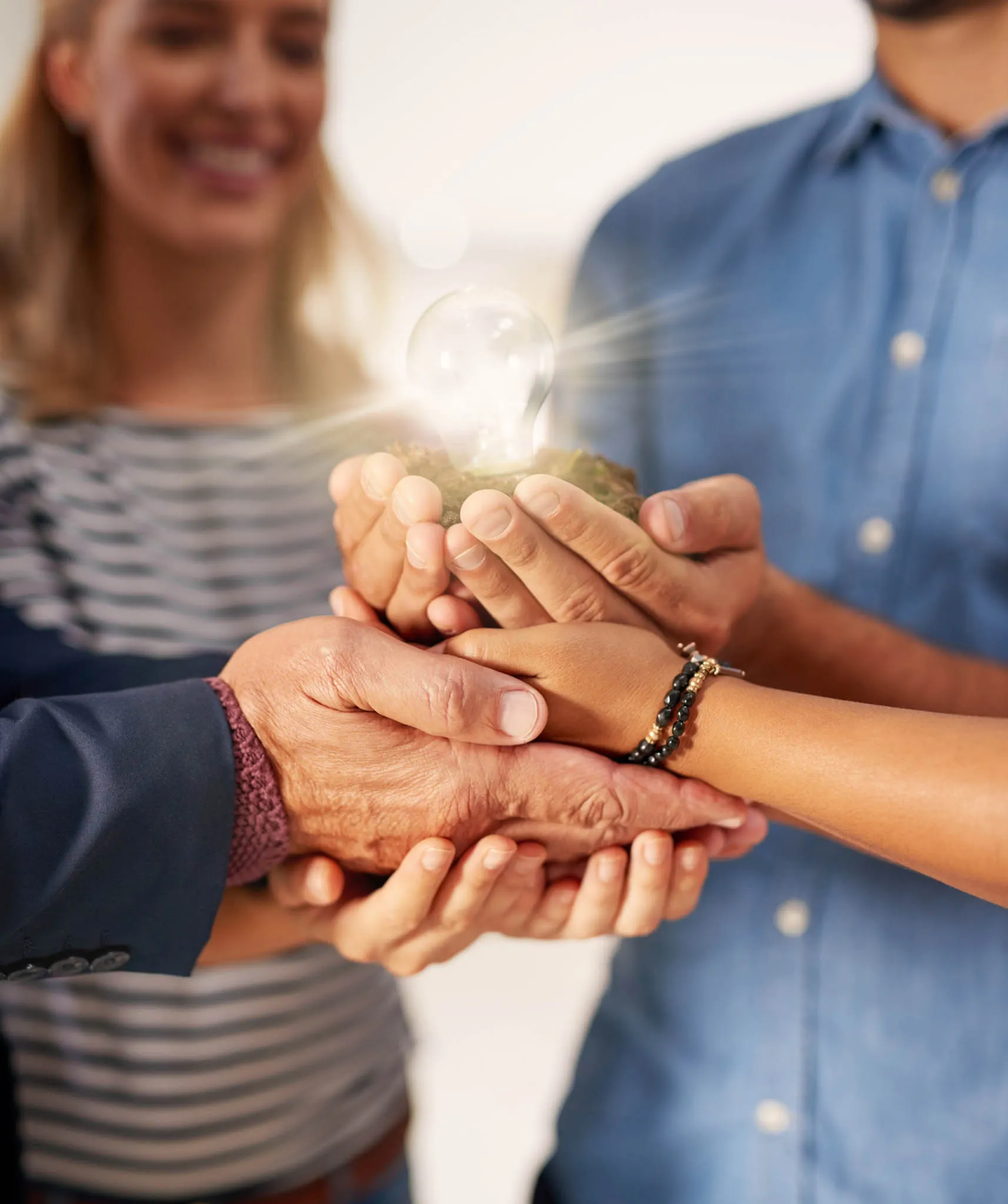 collaboration-hands-lightbulb-with-business-people-office-growth-ideas-solution-closeup-development-eureka-inspiration-with-employee-team-workplace-nurture-our-vision